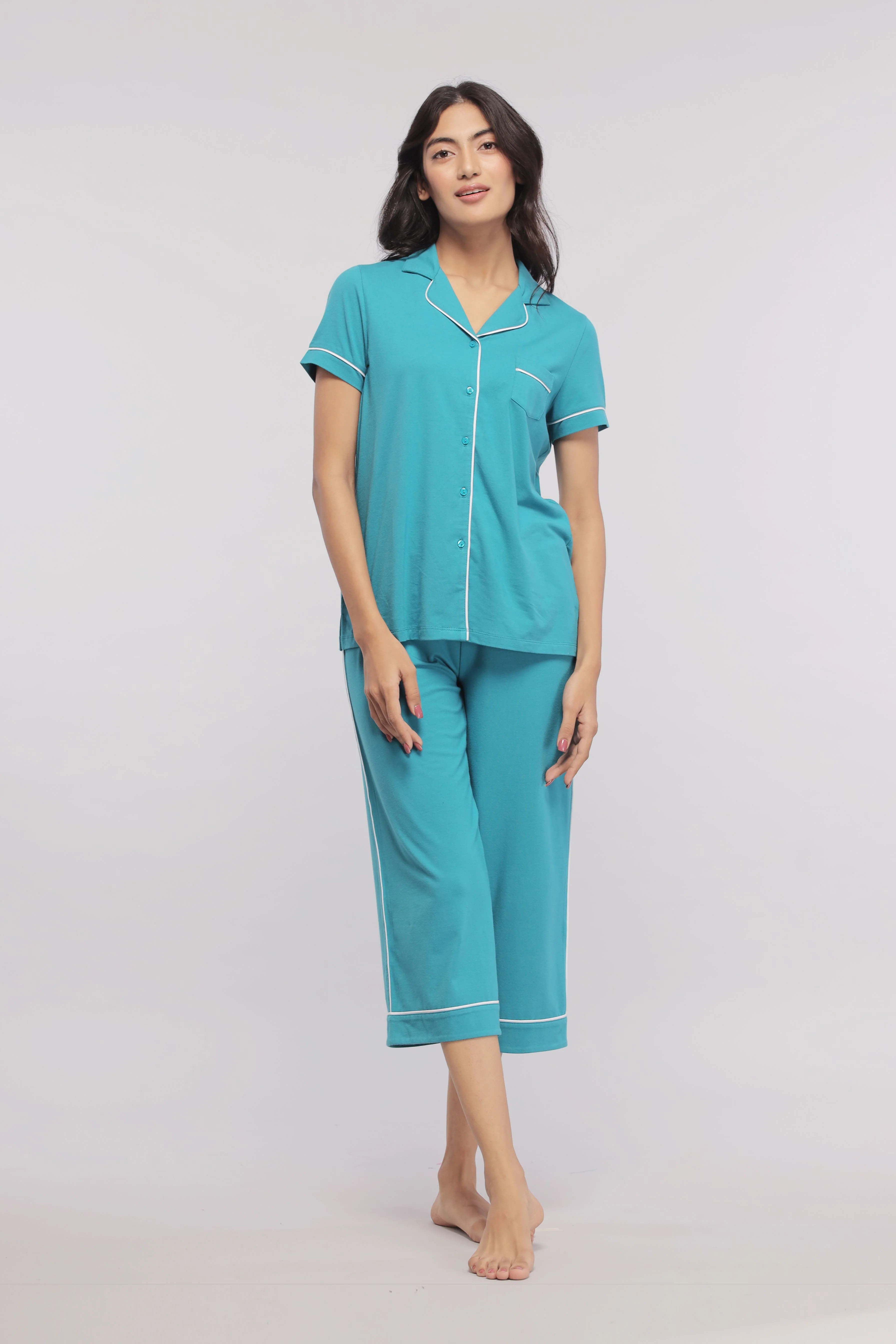 Teal Capris With White Piping - Image 3